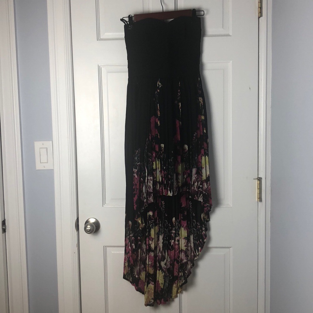 Black bandage top dress and pleated high low skirt